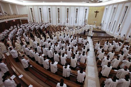 Priests enter in procession for a mass led by Father Eduardo Robles Gil, the new leader of the Legionaries of Christ order, in the order seminary in Rome February 6, 2014. REUTERS/Max Rossi