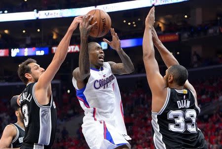 May 2, 2015; Los Angeles, CA, USA; San Antonio Spurs center Boris Diaw (33) and forward Marco Belinelli (3) defend a shot by Los Angeles Clippers guard Jamal Crawford (11) in the first half of game seven of the first round of the NBA Playoffs at Staples Center. Mandatory Credit: Jayne Kamin-Oncea-USA TODAY Sports