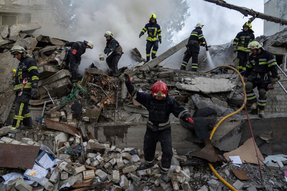 July 4, 2022 : Rescue workers clearing rubble of a destroyed school after an attack in Kharkiv, Ukraine. The Ukrainian military's General Staff says that Russian forces are trying to press their offensive deeper into eastern Ukraine after capturing a key stronghold.