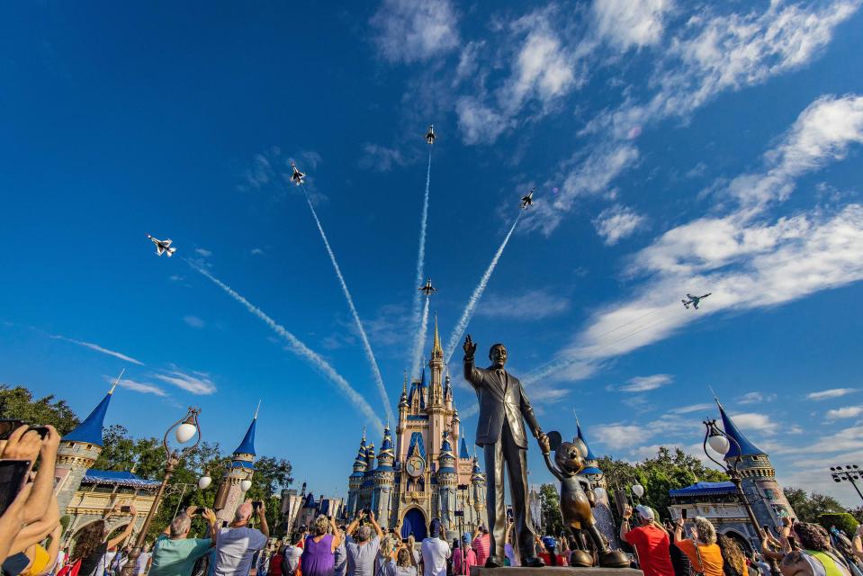 U.S. Air Force Thunderbirds fly over Cinderella Castle at Walt Disney World's Magic Kingdom on Oct. 27, 2022, ahead of National Veterans and Military Families Month in November.