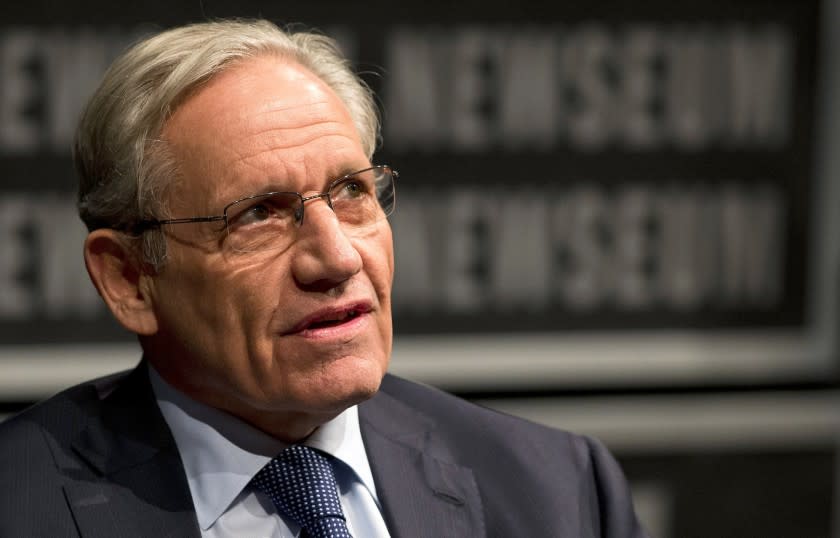 The White House has denied it had threatened Washington Post reporting legend Bob Woodward for his comments on "sequestration" cuts.