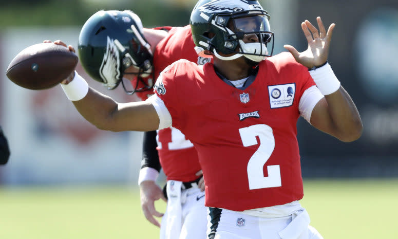 Jalen Hurts throwing at training camp.