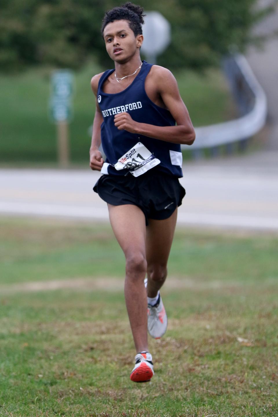 Tadael Mihret, of Rutherford, is shown just before winning the Colonial race of the NJIC Divisional Championships, at Garret Mountain Reservation.  Mihret beat everyone by more than a minute, crossing the finish line in 16:38. Monday, October 3, 2022