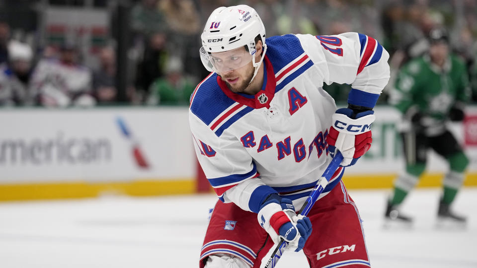 New York Rangers left wing Artemi Panarin looks before making a pass in the first period of an NHL hockey game against the Dallas Stars in Dallas, Monday, Nov. 20, 2023. (AP Photo/Tony Gutierrez)