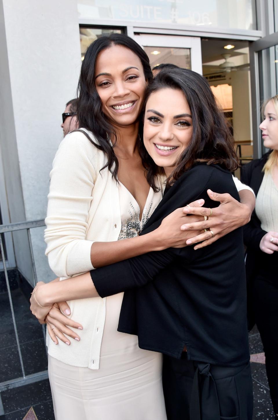 Zoe Saldana (L) and actor Mila Kunis at the Zoe Saldana Walk Of Fame Star Ceremony on May 3, 2018 in Hollywood, California.