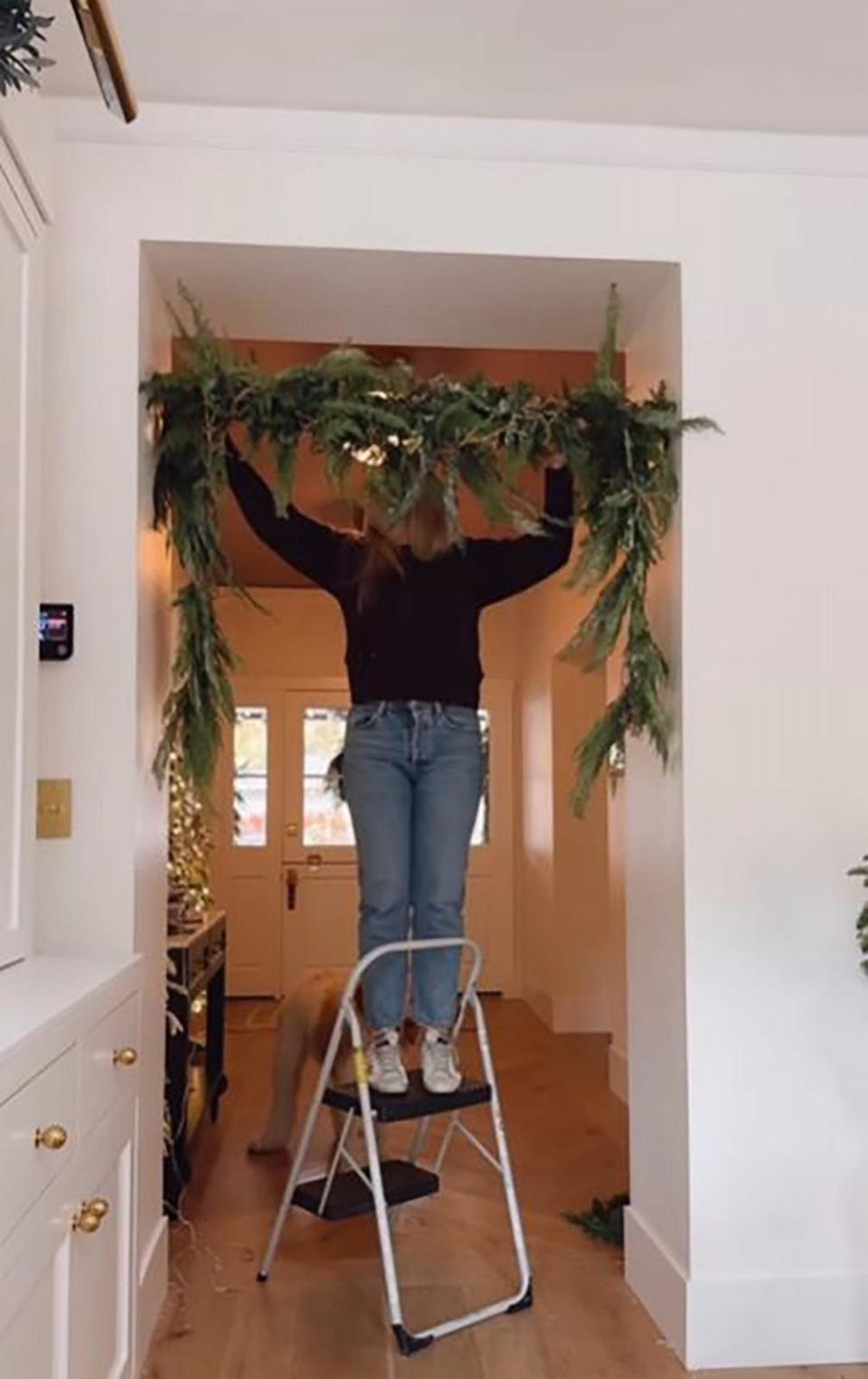 PHOTO: Ashley Stringfellow, founder of Modern Glam, tried the viral garland shower rod hack. (@modernglamhome/Instagram)