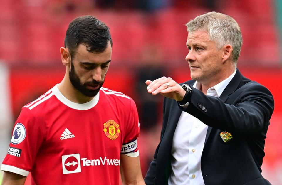 Solskjaer consoles Bruno Fernandes after his penalty miss against Aston Villa  (Getty)