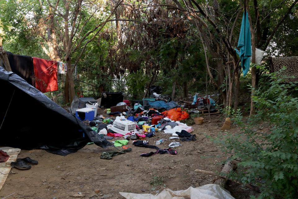 Remnants of a homeless camp in Louisville's Portland neighborhood before it was cleared Aug. 23, 2023.