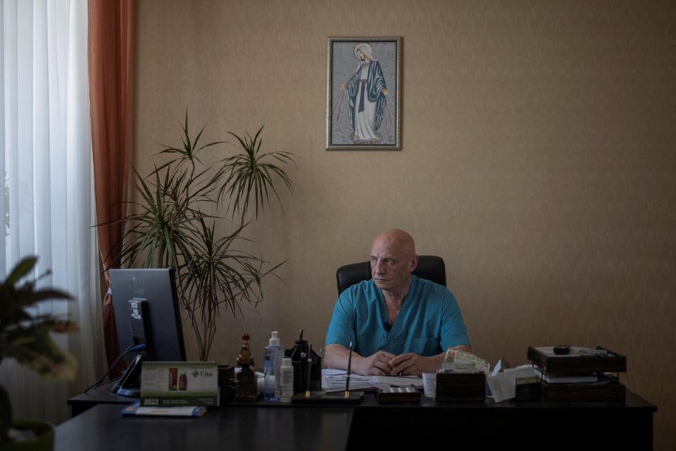 Dr Ivan Tsyganok sits at his desk inside Pokrovsk maternity hospital (Reuters)