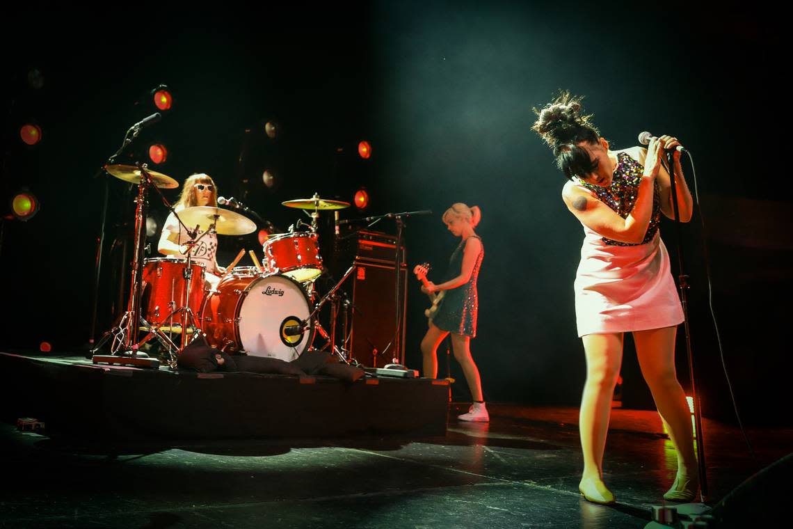 Bikini Kill performs at the Hollywood Palladium. Tobi Vail of Olympia is the drummer. Kathleen Hanna is the lead singer and Kathi Wilcox is the bassist.