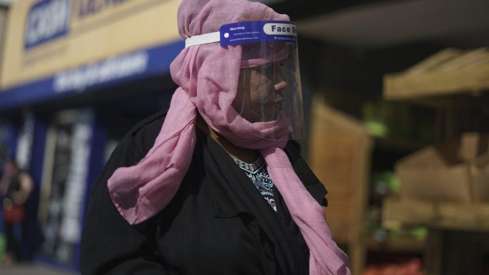Shoppers wear face masks in the High Street on September 22, 2020 in West Bromwich, United Kingdom. (Photo by Christopher Furlong/Getty Images)