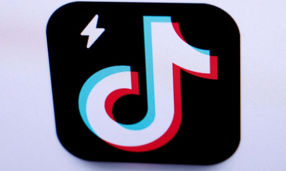 <span>TikTok Lite offers points for ‘tasks’ include watching videos, liking content, following creators or inviting friends to join the app.</span><span>Photograph: Kiran Ridley/AFP/Getty Images</span>
