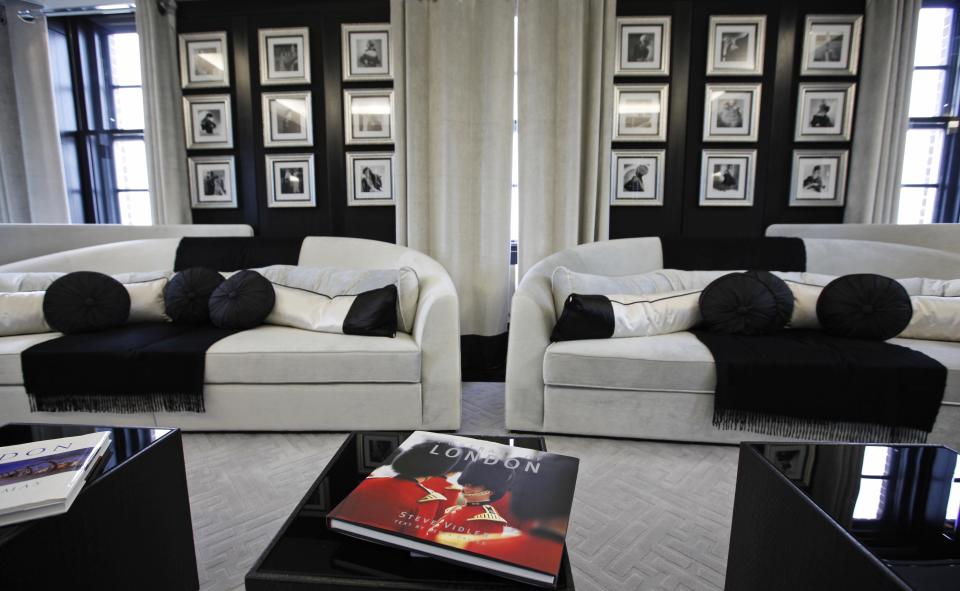 This Friday, March, 16, 2012 photo shows main living room in one of the five bedroom luxury penthouse apartments overlooking Hyde Park, London which is available for hire during the London 2012 Olympics for some 11,000 British pounds (US$17,600) a night - and includes a maid a butler and and Aston Martin car. Most of London's most exclusive hotels have been booked for the Olympics, snapped up by Olympic officials or companies block-booking rooms for favored customers, but there are still amazing places to stay. That is, if you can afford the bill.(AP Photo/Alastair Grant)
