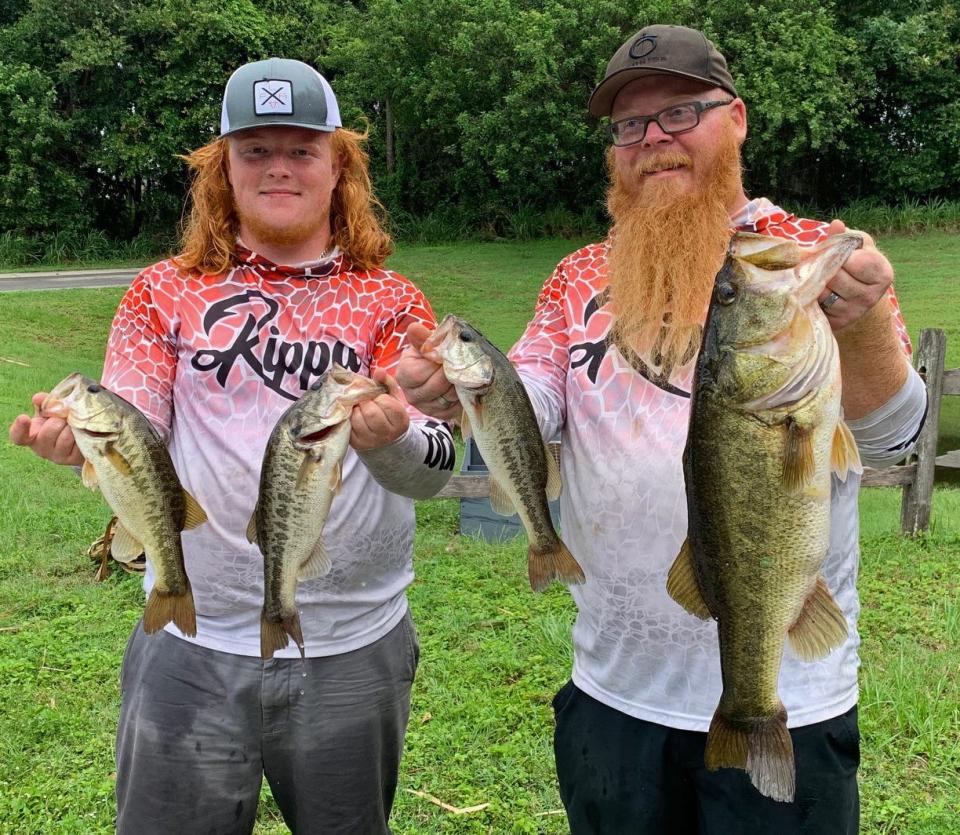 Kip Lehman, left, and Chad Lehman had 13.69 pounds and big bass with an 8.22 pounder to win first place during the Freedom Bass Anglers tournament June 11 at Lake Juliana. 