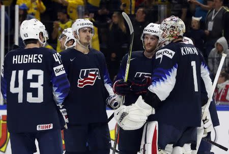 Ice Hockey - 2018 IIHF World Championships - Semifinals - Sweden v USA - Royal Arena - Copenhagen, Denmark - May 19, 2018 - Team USA look dejected after loosing a match. REUTERS/Grigory Dukor