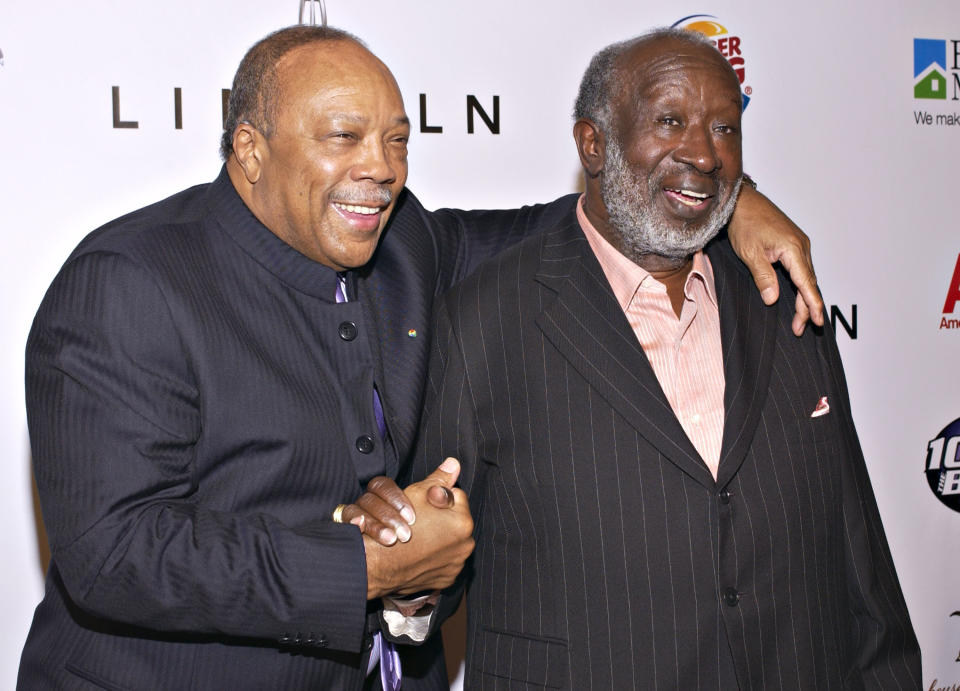 Producers Quincy Jones and Clarence Avant arrive at the 20th Annual “Midsummer Night’s Magic Awards Dinner” on July 13, 2005 at the Century Plaza Hotel in Los Angeles, California.