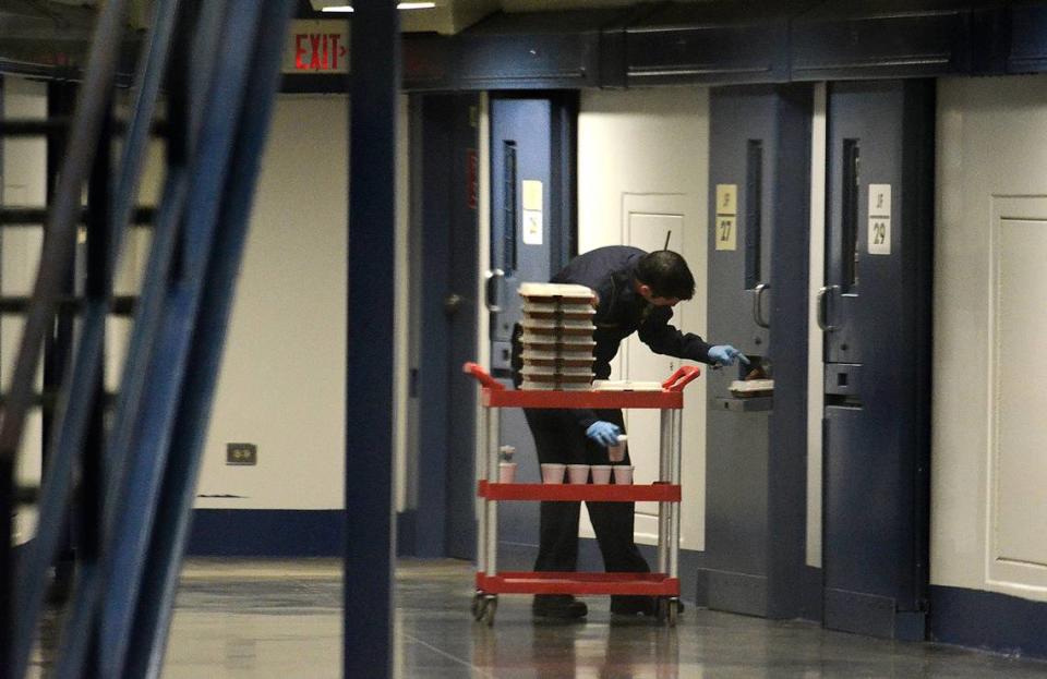 In this photo, taken in 2015, a correctional officer delivered food to inmates in a medium custody cell block at Lanesboro Correctional Institution.