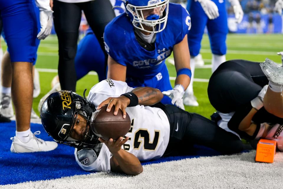 Boyle County Rebels quarterback Sage Dawson (2) scores a touchdown during the KHSAA Class 4A 2023 UK HealthCare Sports Medicine state finals football game between Covington Catholic Colonels (14-0) and Boyle County Rebels (14-0) on Friday, Dec. 1, 2023, at Kroger Field in Lexington, Ky. Boyle County won 41-0.