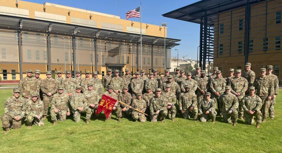 Members of the 1st Detachment of the 1st Battalion, 163rd Field Artillery of the Indiana Army National Guard pose for a group picture in Iraq in mid-July.