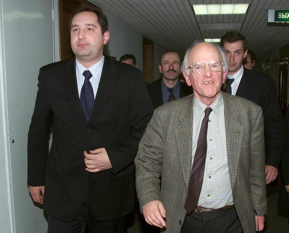 Judd in 2001 with a Russian minister after briefing Duma deputies about his recent trip to Chechnya in his capacity as head of the Council of Europe's delegation of human rights monitors - Sergei Chirikov/EPA/Shutterstock