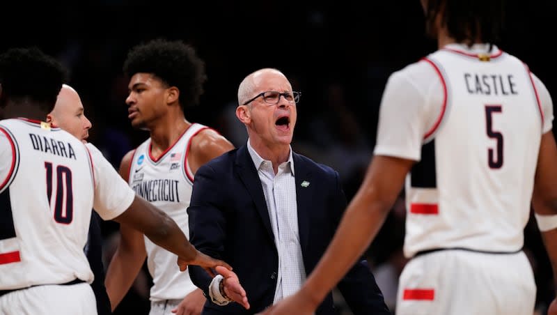 UConn head coach Dan Hurley talks to his players during a time-out in a first-round college basketball game against Stetson in the NCAA Tournament, Friday, March 22, 2024, in New York.