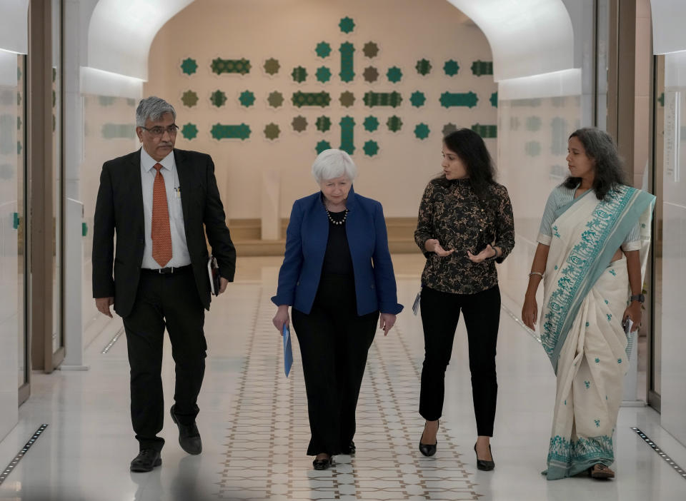 FILE - U.S. Secretary of the Treasury Janet L. Yellen, second from the left, takes a tour of Microsoft India Development Center in Noida, on the outskirts of New Delhi, India, Friday, Nov. 11, 2022. (AP Photo/Manish Swarup, File)
