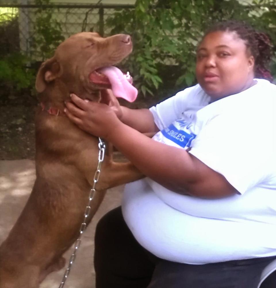 Vinesa Glenn and her dog Brownie.