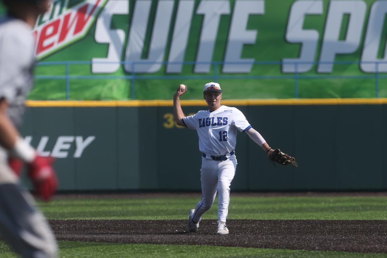 Eastern’s Landon Waugh throws the runner out at first against Shelby County in the Clark's Pump-N-Shop Baseball State Tournament.June 3, 2023 