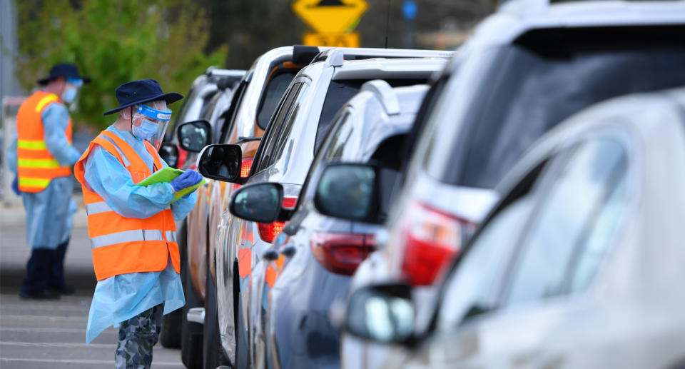 Cars queuing for coronavirus tets. Source: AAP
