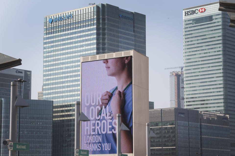 Information screens saluting local heroes on a main road passing Canary Wharf in east London as the UK continues in lockdown to help curb the spread of the coronavirus. (Photo by Victoria Jones/PA Images via Getty Images)