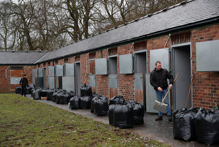 Horse Racing - Newcastle - Newcastle Racecourse, Newcastle upon Tyne, Britain - February 8, 2019 General view of the stables being cleaned by staff at the racecourse after the meeting is cancelled following the confirmed outbreak of equine flu Action Images via Reuters/Lee Smith