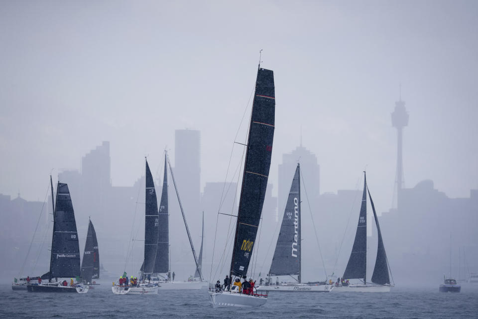 Boats compete during the start of the Sydney Hobart yacht race in Sydney, Tuesday, Dec. 26, 2023. The 630-nautical mile race has more than 100 yachts starting in the race to the island state of Tasmania. (Salty Dog/CYCA via AP)