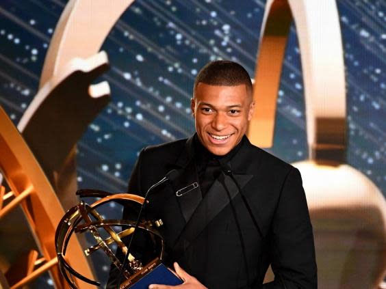 Mbappe accepts the Ligue 1 player of the year award (AFP/Getty Images)