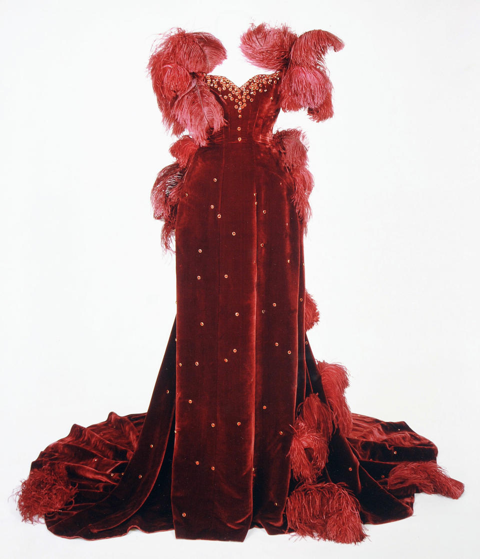 This undated handout photo provided by the Harry Ransom Center shows the burgundy ball gown worn by Vivien Leigh as Scarlett O'Hara in "Gone With The Wind." The ball gown as well as the iconic green curtain dress from the 1939 film were saved from deterioration by a $30,000 conservation effort by the Harry Ransom Center at the University of Texas, and are on display for the first time in nearly 30 years at London's Victoria and Albert Museum as part of a Hollywood costume exhibit. (AP Photo/Harry Ransom Center)