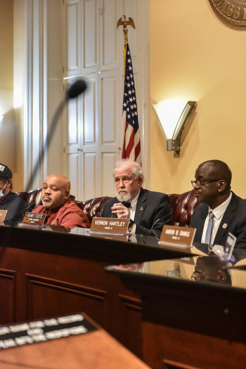 From left: Ward 4 Councilman Brian Grizzell, Ward 1 Councilman Ashby Foote and Ward 5 Councilman Vernon Hartley, discuss the city's garbage collection during a meeting of the Jackson City Council on April 10, 2023.