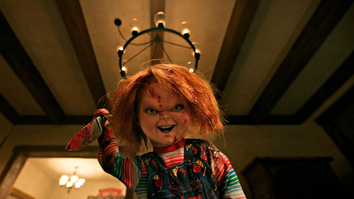  Chucky with a knife stabbing. 