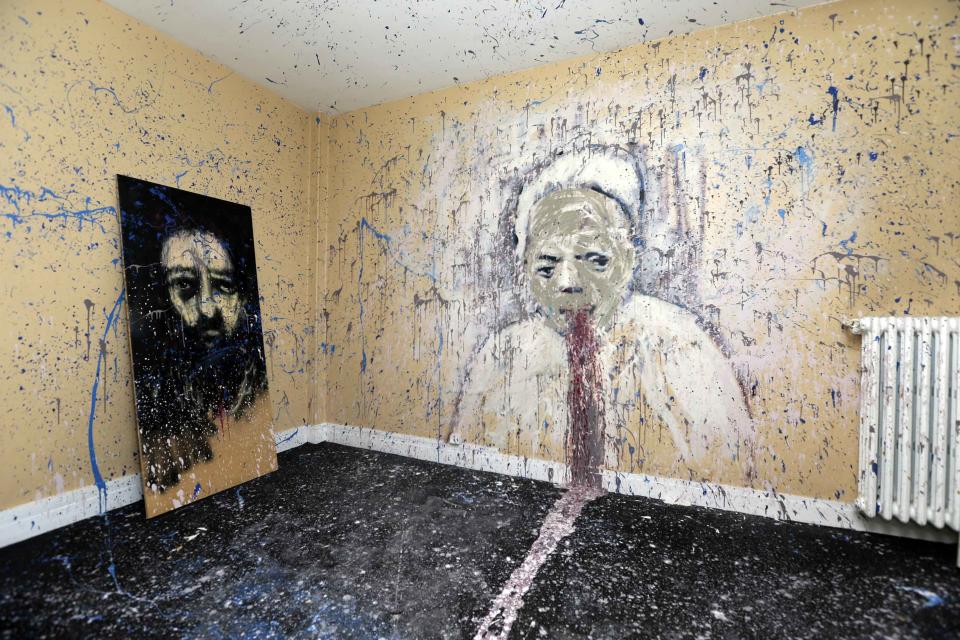 A bedroom painted by Tunisian street artist Dabro is seen at the street art project tower "Paris Tour 13" in Paris