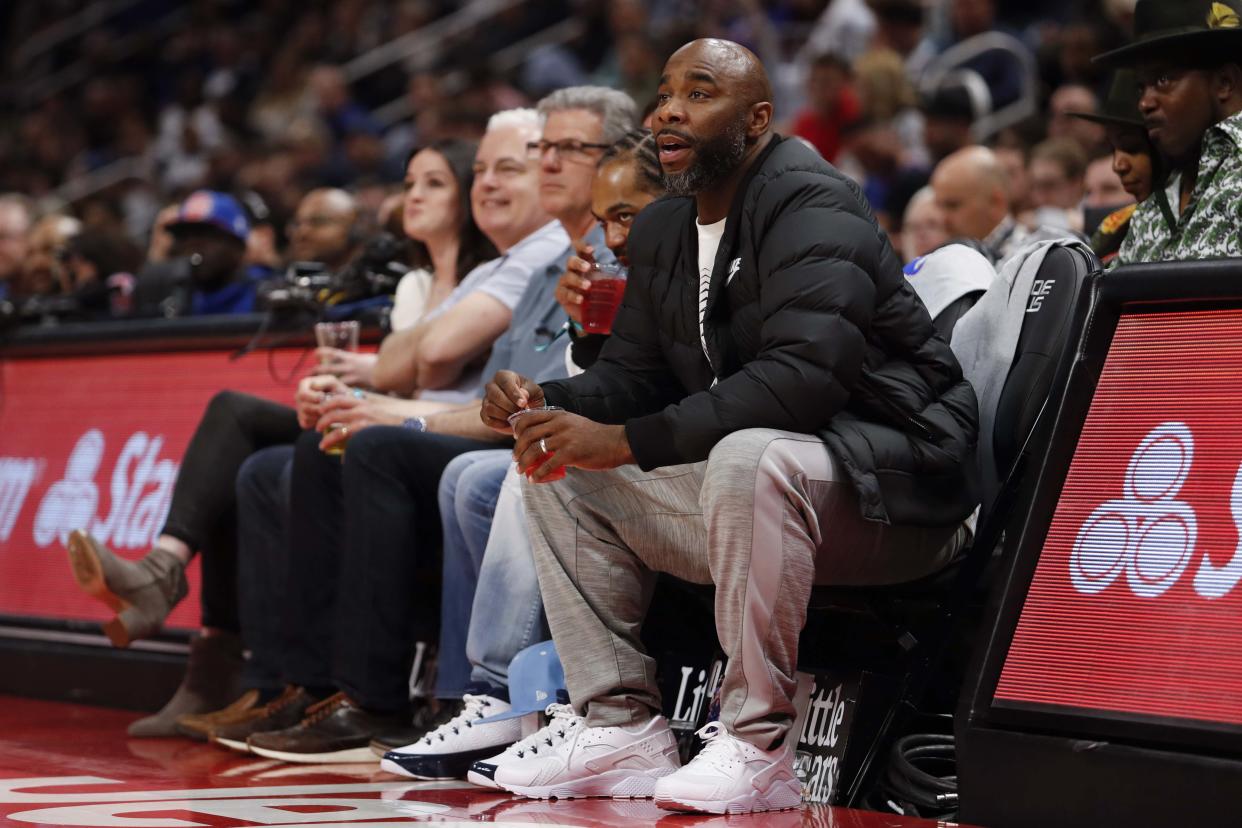 Apr 7, 2019; Detroit, MI, USA; Former professional basketball player Mateen Cleaves sits in the front row during the third quarter in the game between the Detroit Pistons and the Charlotte Hornets at Little Caesars Arena. Mandatory Credit: Raj Mehta-USA TODAY Sports