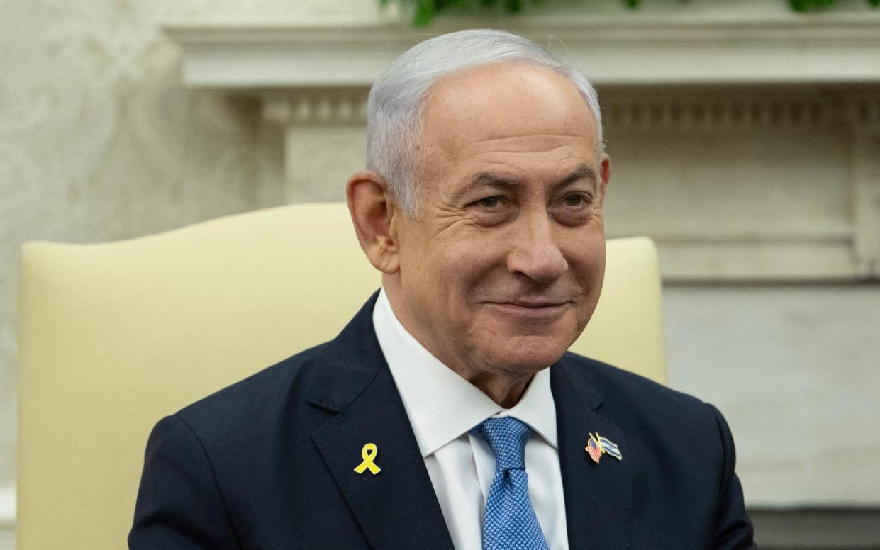 Israeli Prime Minister Benjamin Netanyahu attends a meeting with US President Joe Biden