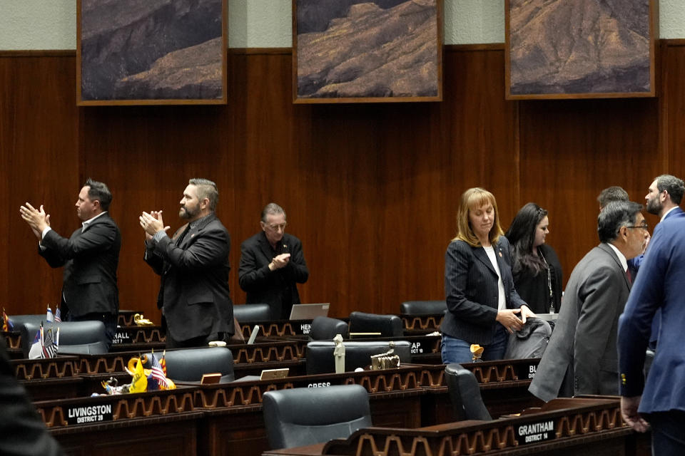 Republican Arizona State Representatives applaud the gallery from the House floor, Wednesday, April 17, 2024, at the Capitol in Phoenix. House Republicans have again blocked an effort for the chamber to take up legislation that would repeal Arizona’s near-total ban on abortions. (AP Photo/Matt York)