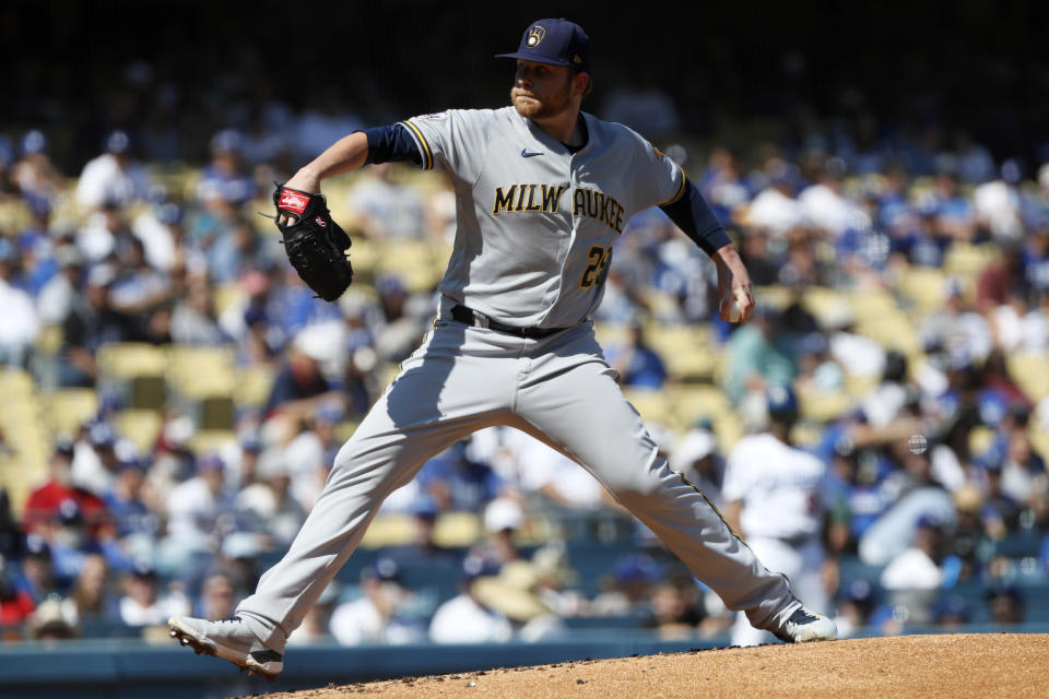 Milwaukee Brewers starting pitcher Brett Anderson throws to a Los Angeles Dodgers batter during the first inning of a baseball game in Los Angeles, Sunday, Oct. 3, 2021. (AP Photo/Alex Gallardo)