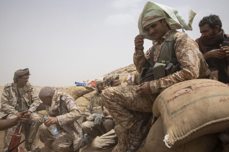 Yemeni fighters backed by the Saudi-led coalition on the front lines near Marib, Yemen, Saturday, June 19, 2021. (AP Photo/Nariman El-Mofty)