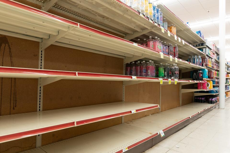 Empty shelves where bottled water usually sits were seen last Wednesday at the Seabrook Apple Market,1945 S.W. Gage Blvd.