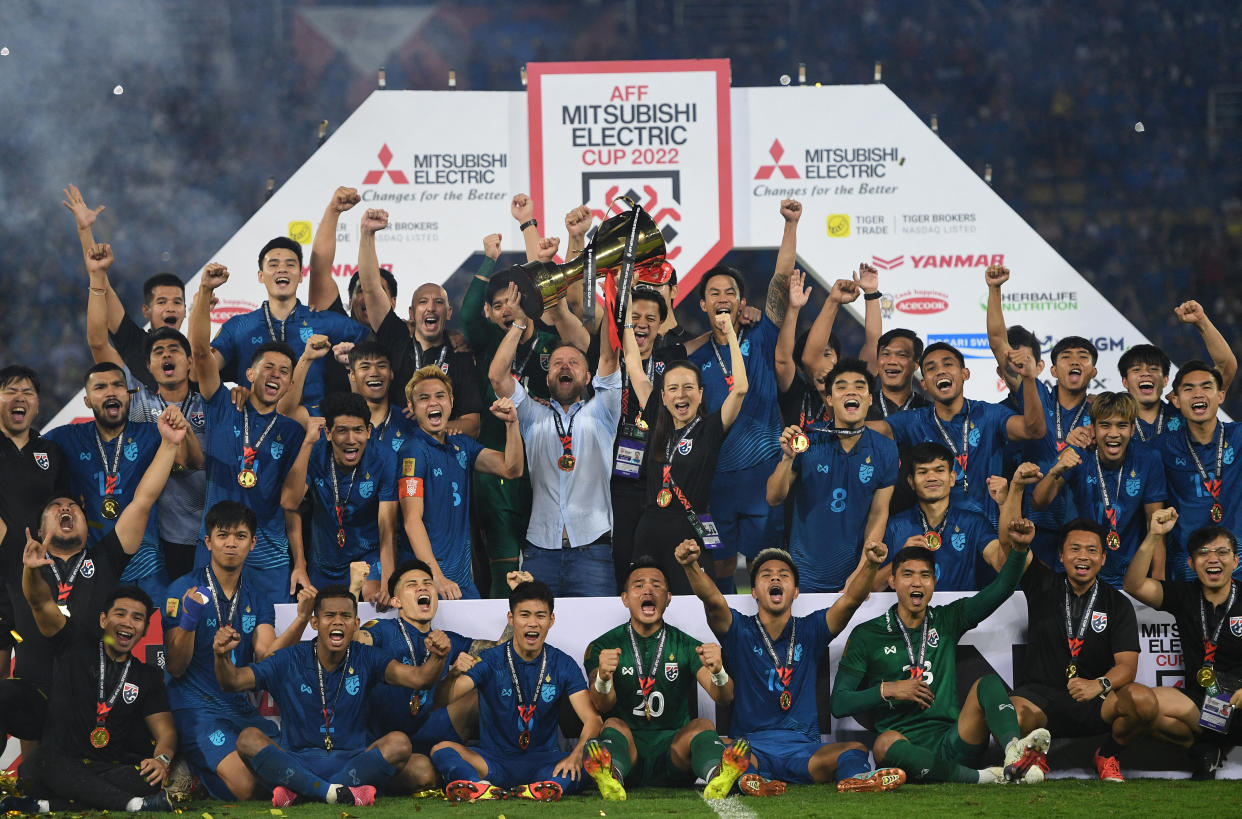 Thailand national team with the ASEAN Mitsubishi Electric Cup they won in 2023.