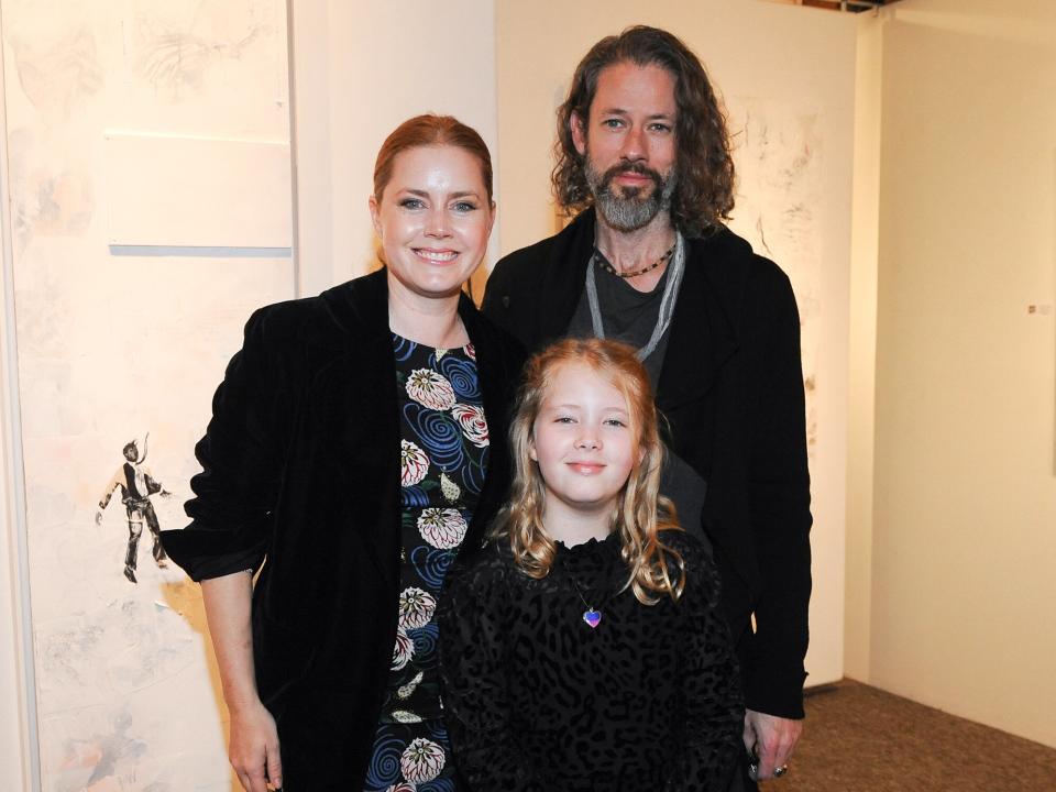 Amy Adams, Darren Legallo and Aviana Legallo attend the Trigg Ison Fine Art In Association With Krista Smith And Sam Taylor-Johnson Present Darren Legallo "From Destruction" event on January 10, 2020 in West Hollywood, California