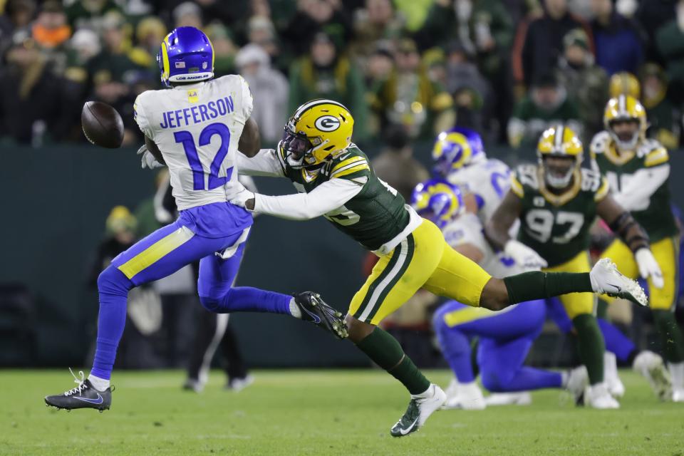 Green Bay Packers' Rasul Douglas breaks up a pass intended for Los Angeles Rams' Van Jefferson during the second half of an NFL football game Sunday, Nov. 28, 2021, in Green Bay, Wis. (AP Photo/Matt Ludtke)