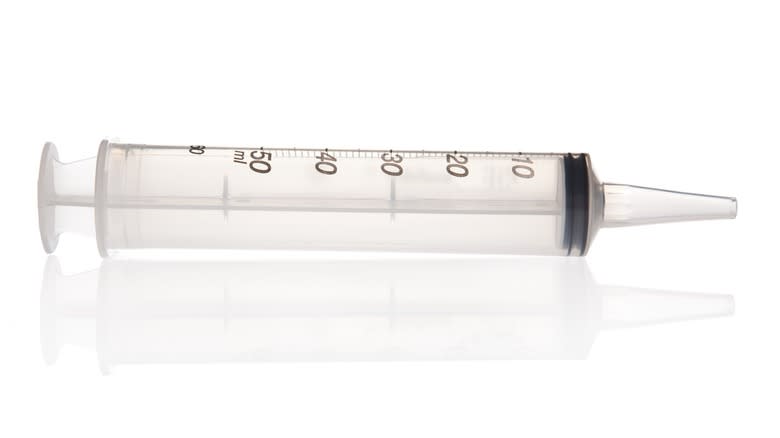 Large plastic syringe