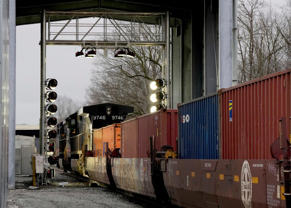 A Norfolk Southern train passes through a digital train inspection portal in Columbiana County, west of East Palestine Thursday, January 25, 2024. The portal contains 38 high-resolution cameras equipped with stadium lighting.
As a train comes through the portal the system captures between 700-1,000 pictures per car, giving a 360-degree image of each rail car to. AI is used to find defects.