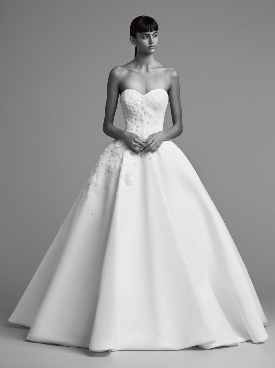 <p>Strapless ball gown with small floral appliqués. (Photo: Marijke Aerden) </p>