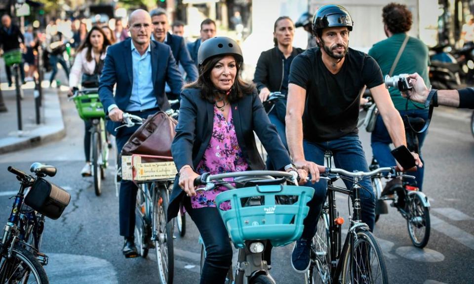 Mayor of Paris Anne Hidalgo, centre, has made efforts to clean up the city’s image, but still faces criticism.